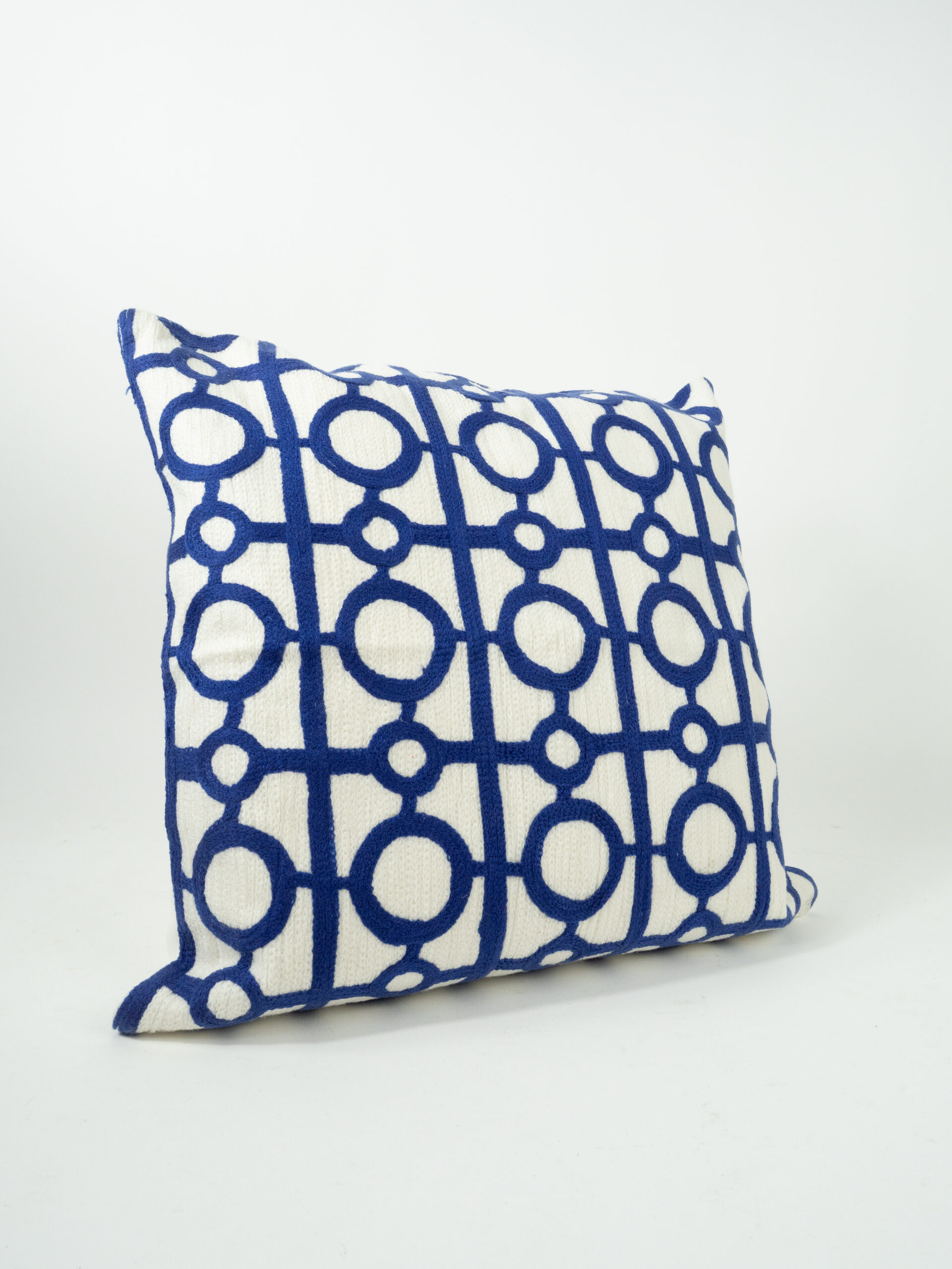 WHITE PILLOW W/ ROYAL CIRCLES